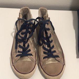 Gold sparkly high top converse